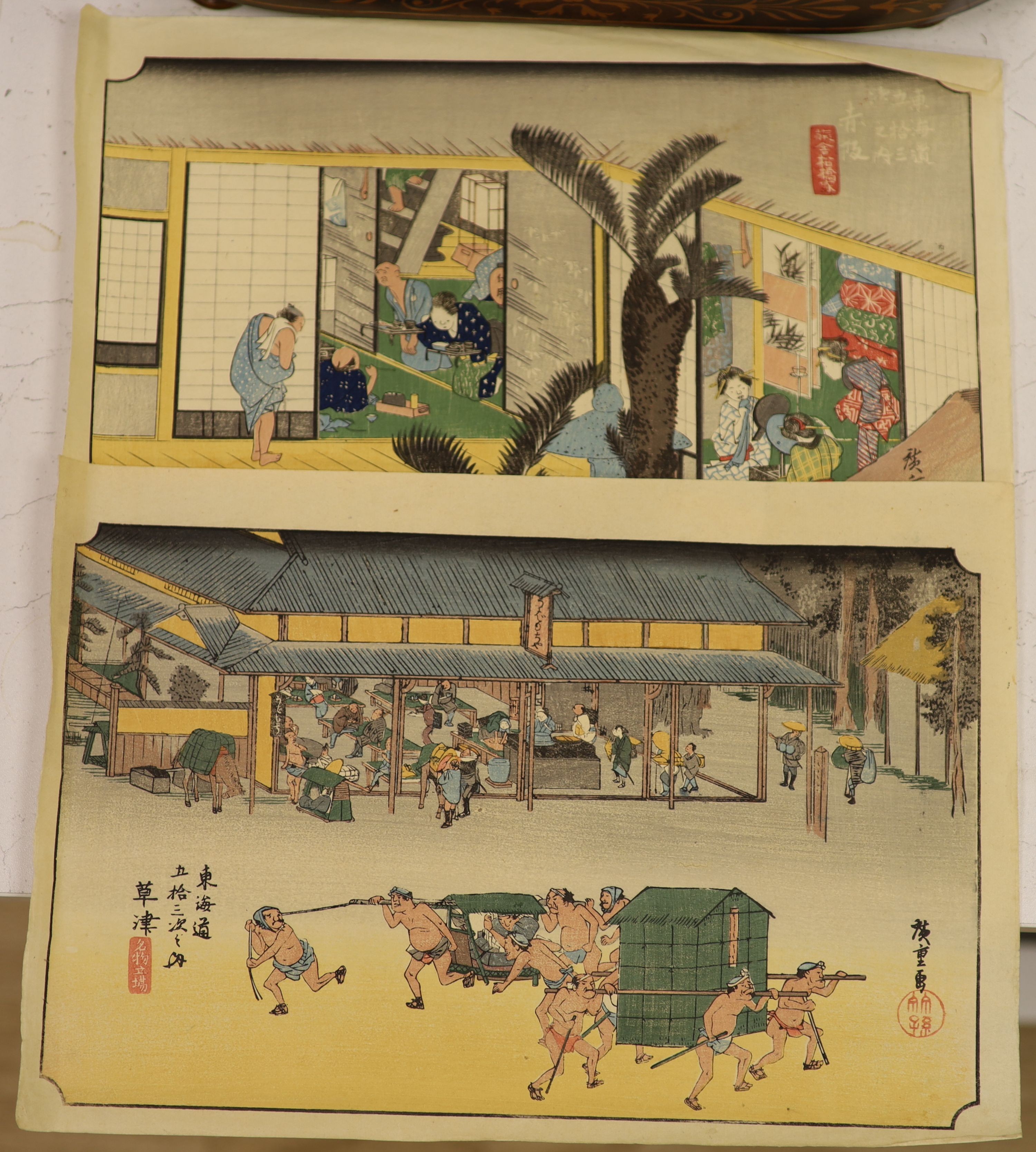 Japanese School, two woodblock prints, Porters carrying nobles and View outside a house, overall 25 x 37cm, unframed